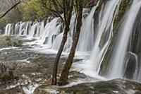 China, Sichuan, Blurred waterfall at Jiuzhaigou Va