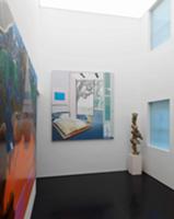 Pictures and sculpture in modern room with skyligh