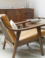 50s armchair with brown leather cushions