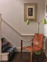 Leather chair and 50s-style standard lamp with gre