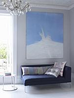 Modern, blue recamier and painting in living room