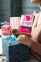 Woman wrapping presents