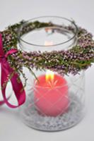 Candle in jar decorated with heather wreath