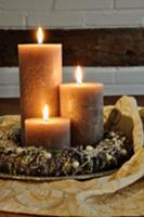 Festive table decor with wreath & three candles on