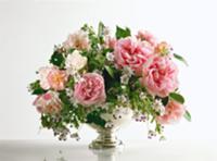 Bouquet of roses in silver bowl