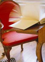 Antique ensemble of desk and chair with red uphols