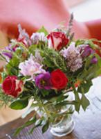 Summer posy with red roses and rosemary in glass v