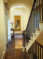 Traditional hall and staircase in period setting w