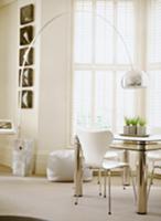 Small, black and white dining area with Italian de