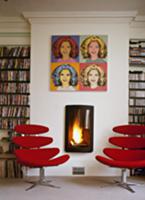 Library with red, modern swivel chairs and pop art