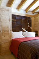 Modern bedroom with rustic wooden wardrobe and pan