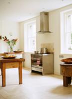 Plain kitchen with stainless steel cooker and extr