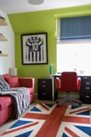 Rug with Union Jack motif in front of desk and win