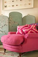 Antique armchair upholstered in pink velvet with c