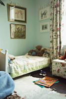 Corner of traditional child's bedroom with soft to