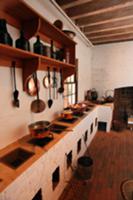 Rustic kitchen with multiple hearths in masonry co