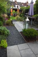 Dining area on terrace in modern garden