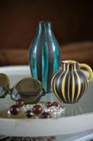 Tray with two different striped vases and sunglass