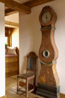 Antique grandfather clock with curved case and an 