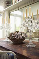 Crystal candelabras and small basket filled with f