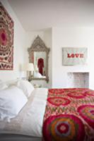 Romantic bedroom with jazzy, playful and antique e