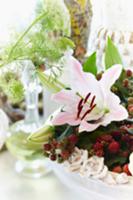 Summery flower bouquet with lilies and blackberrie