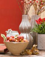 Autumn table decorations with ornamental apples an