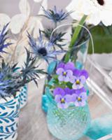 Centrepiece with gerberas, roses, violas and sea-h