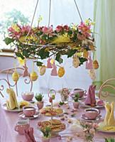 Wreath of tulips and narcissi hanging over Easter 