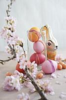 Easter arrangement of dyed eggs, chocolate rabbit 