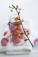 Easter arrangement of dyed eggs & sprig of cherry 