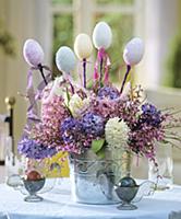 Easter arrangement of hyacinths decorated with egg