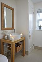 Washstand with countertop sink on wooden frame and