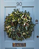 Advent wreath on blue front door