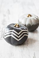 Pumpkins painted grey with white pattern and grey 