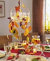 Hanging metal tray with tealights and autumn leave