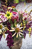 Autumnal bouquet in purple and yellow