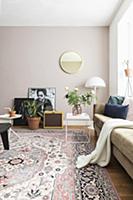 Sofa, side table, standard lamp, mirror and rug in