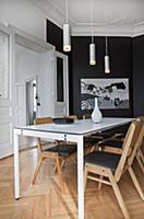 Elegant black-and-white dining room in period apar