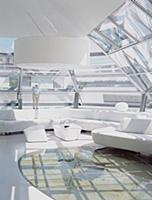 Futuristic living room with glass ceiling and glas