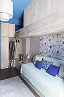 Modern, concrete bunk beds in blue and grey bedroo