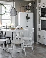 Windsor chairs at dining table in grey-and-white k