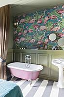 Flamingo-patterned wallpaper and wainscoting in ba