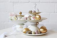 Easter eggs on cake stand made from vintage-style 