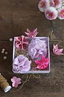 Pink origami flowers and lilac fabric flowers