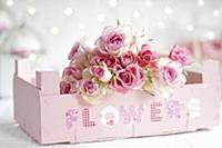 Bouquet of roses in fruit crate painted pastel pin