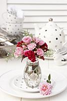 Bouquet of roses with cockscomb and gypsophila in 