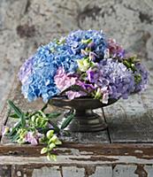 Hydrangeas and sweet peas in bowl