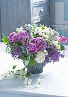 Bouquet of peonies, roses, flowering dogwood and a