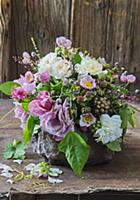 Lavish bouquet of roses, Japanese anemones, blackb